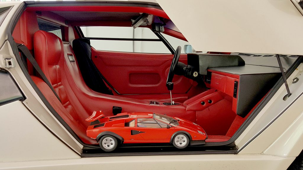 Image of ModelSpace 1:8 scale model Lamborghini Countach, inside a real Countach, for a blog interview with ModelSpacer Allan Lambo