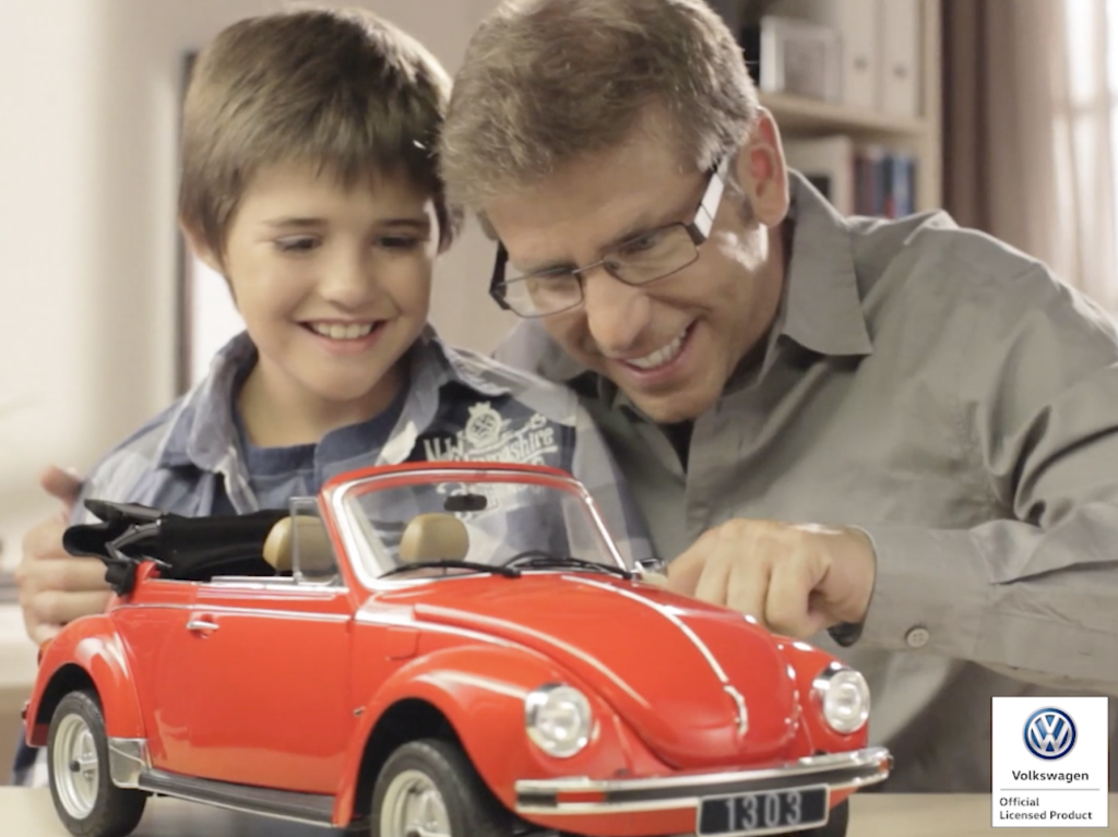 Image of a father and son building a ModelSpace VW Beetle scale model, as part of a blog about activities to do at home.